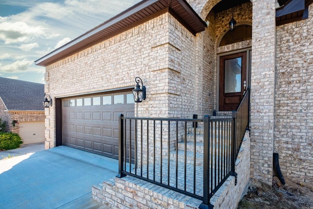 property entrance with a garage