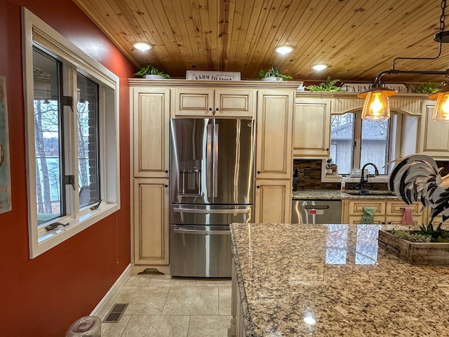 kitchen with sink, wood ceiling, decorative light fixtures, stainless steel appliances, and light stone countertops