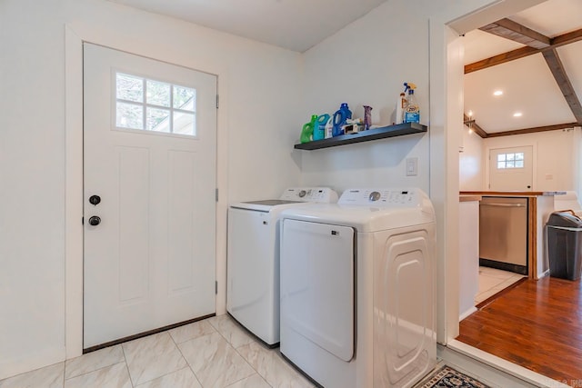 washroom featuring washer and dryer