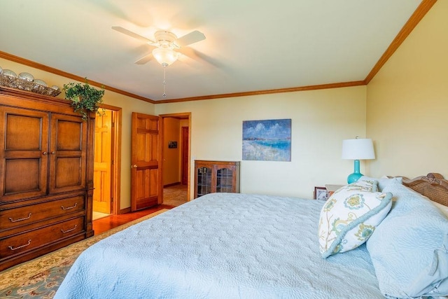 bedroom featuring ceiling fan and ornamental molding