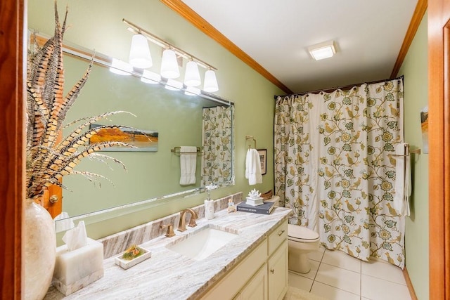 bathroom featuring crown molding, tile patterned floors, vanity, and toilet