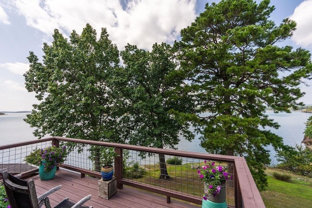 deck featuring a water view