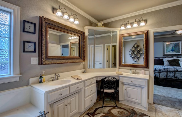 bathroom featuring vanity, crown molding, a bathing tub, and a healthy amount of sunlight