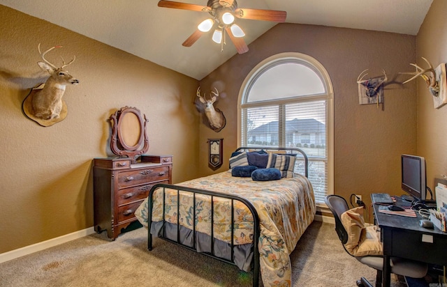 bedroom with lofted ceiling, light colored carpet, and ceiling fan