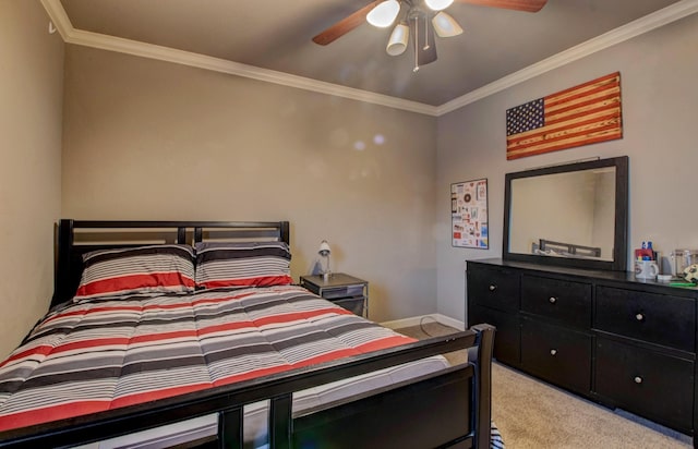 carpeted bedroom featuring crown molding and ceiling fan