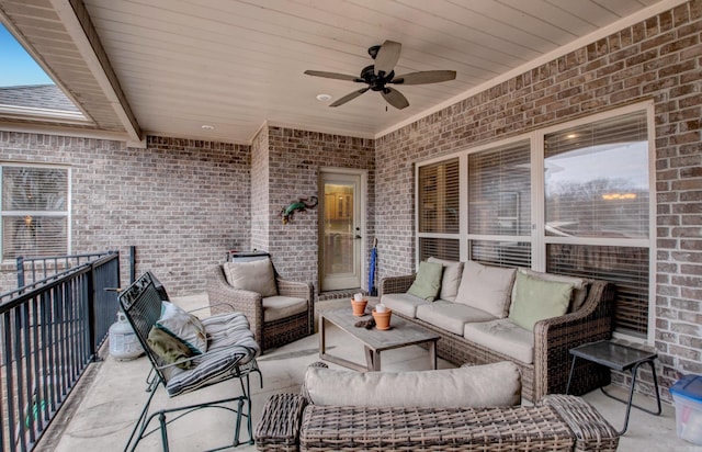 view of patio / terrace featuring ceiling fan, an outdoor hangout area, and a balcony