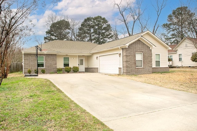 ranch-style house featuring a garage and a front yard