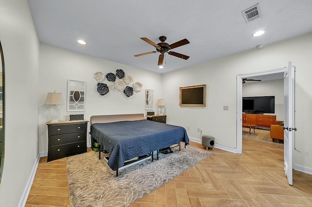 bedroom featuring ceiling fan and light parquet flooring