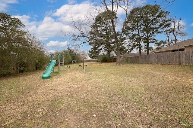 view of yard with a playground