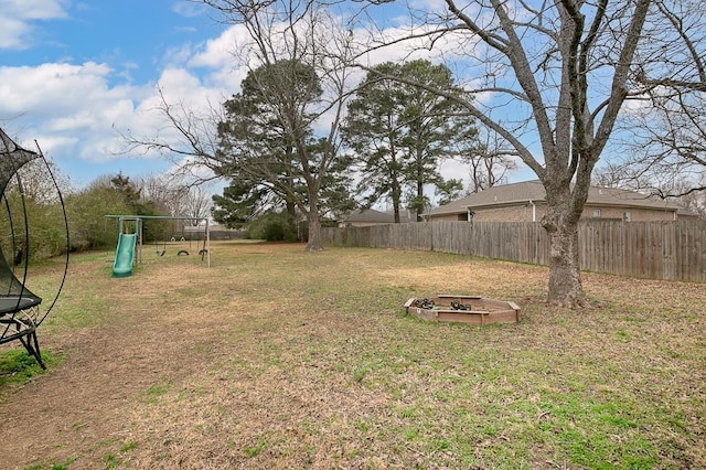 view of yard featuring a playground