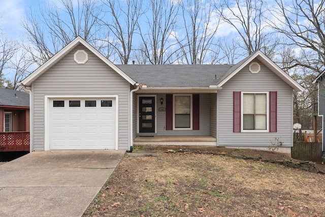 single story home with a garage and covered porch