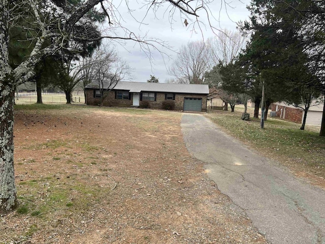 ranch-style house with a garage