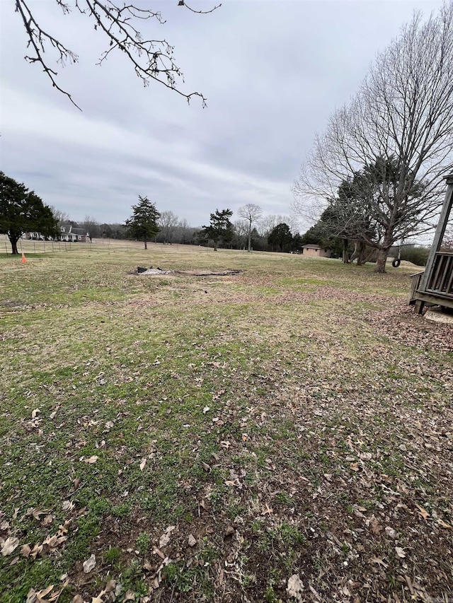 view of yard with a rural view