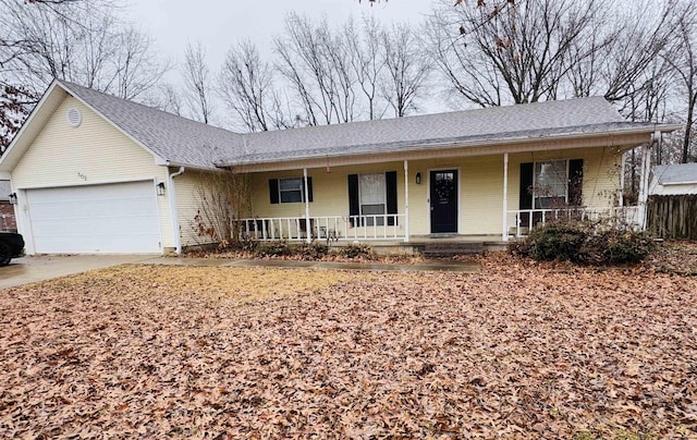 ranch-style house featuring a garage and a porch