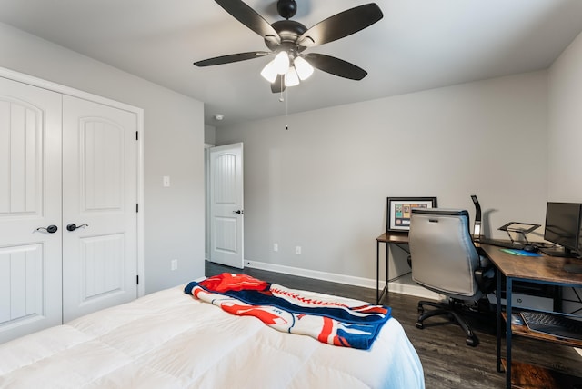 bedroom with hardwood / wood-style flooring, ceiling fan, and a closet