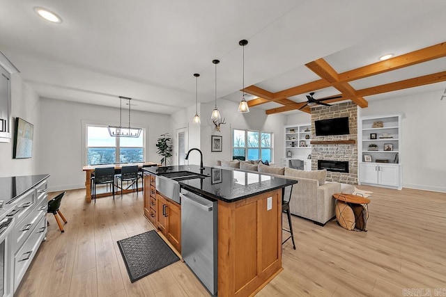 kitchen with pendant lighting, dishwasher, an island with sink, a breakfast bar area, and coffered ceiling