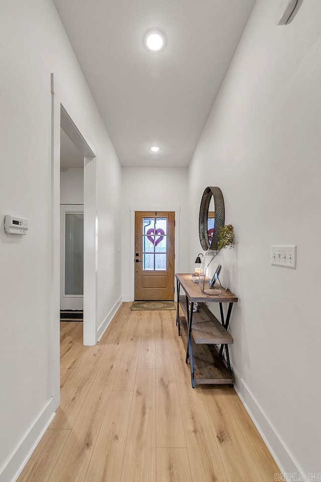 doorway to outside featuring light hardwood / wood-style floors