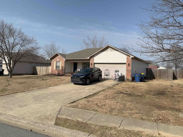 single story home featuring a garage