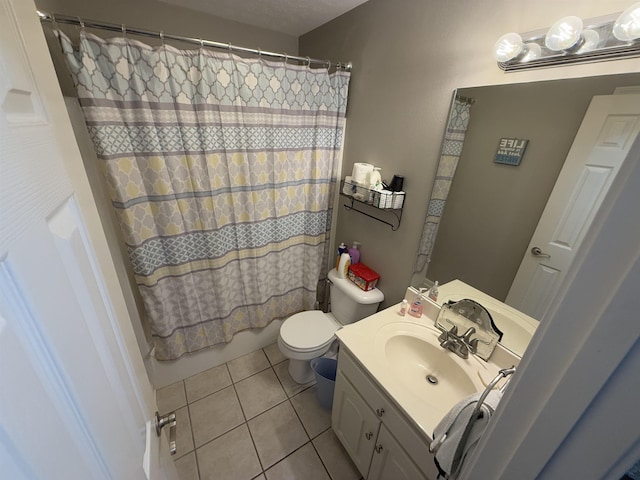 full bathroom featuring shower / bathtub combination with curtain, vanity, toilet, and tile patterned flooring