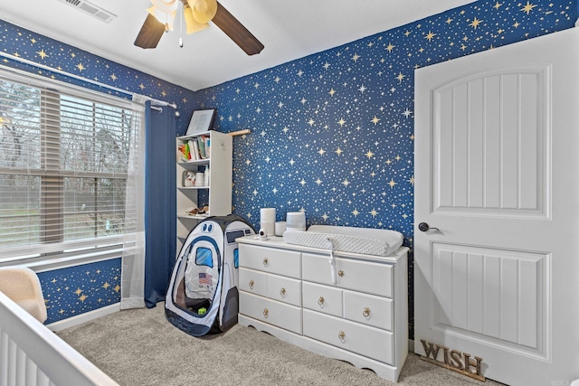 carpeted bedroom featuring ceiling fan