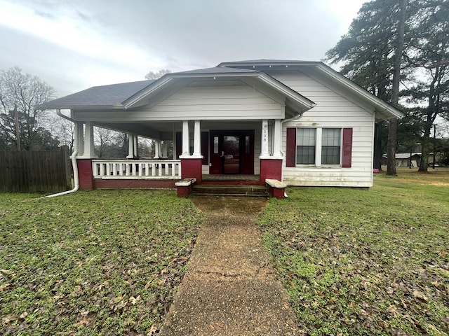 508 Main St, Horatio, AR 71842 - view of front of home with a porch and a front yard