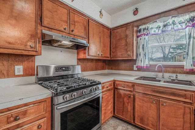 kitchen featuring gas range and sink