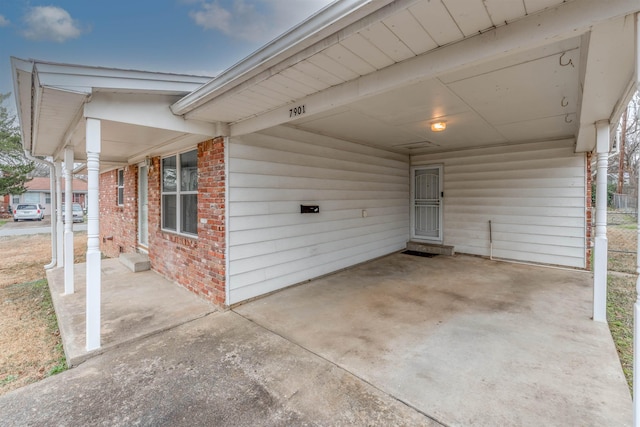 view of patio / terrace with a carport