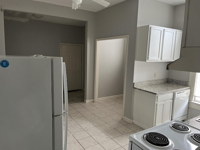 kitchen featuring ceiling fan, light tile patterned floors, white cabinets, and white appliances