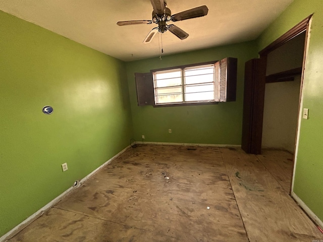 unfurnished room with ceiling fan