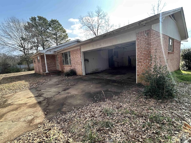 view of home's exterior with a garage