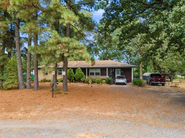 view of front of property with a carport