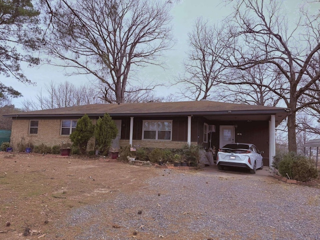 single story home with a carport