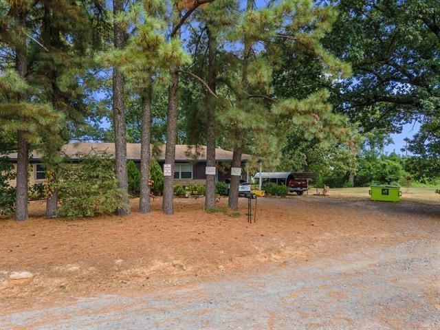 view of yard with a carport