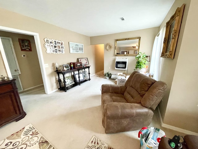 carpeted living room featuring heating unit