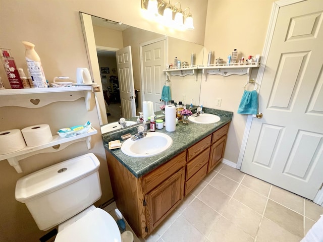 bathroom featuring tile patterned floors and vanity