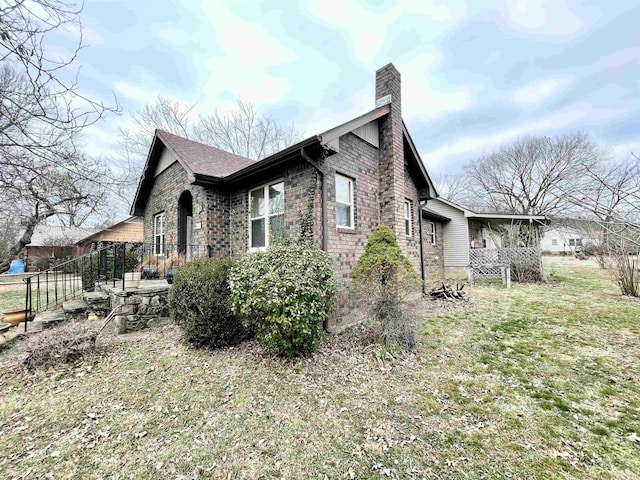 view of home's exterior featuring a lawn