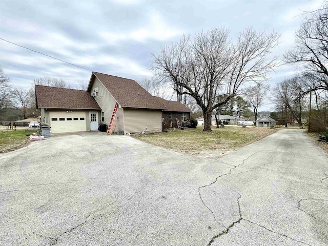 view of home's exterior with a garage