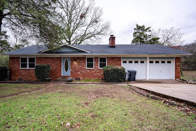 ranch-style house with a garage and a front yard