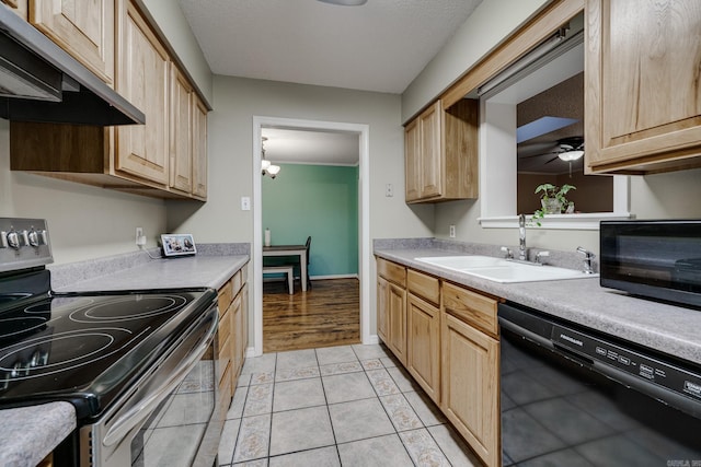 kitchen featuring stainless steel electric range oven, dishwasher, sink, light tile patterned floors, and ceiling fan