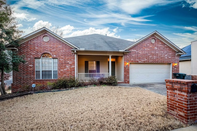 view of front of home featuring a porch and a garage