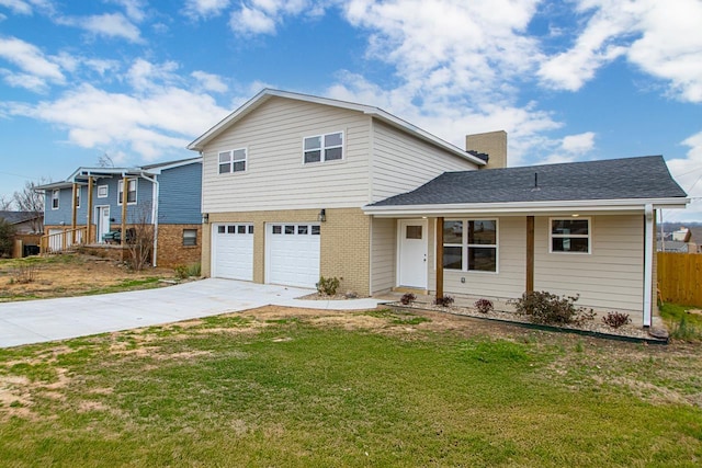 view of front facade featuring a garage and a front lawn