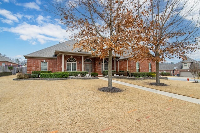 view of front of home with a front lawn