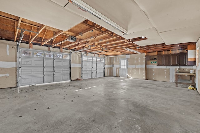 garage featuring a garage door opener