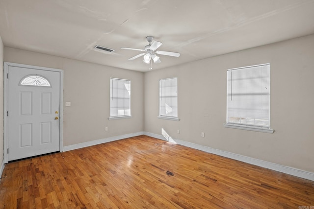 foyer entrance featuring light hardwood / wood-style flooring and ceiling fan