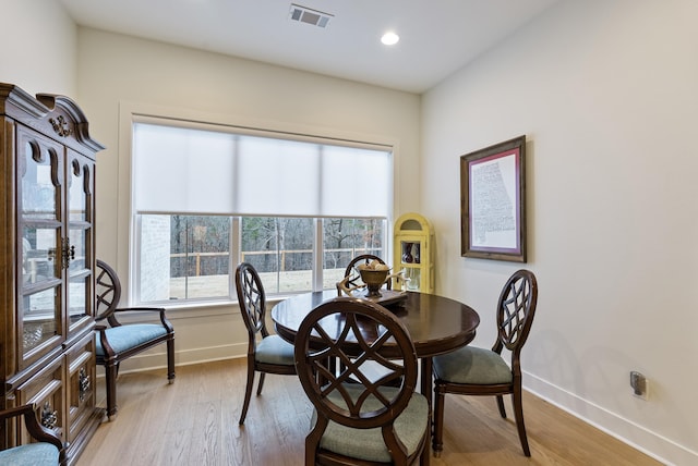 dining room featuring light hardwood / wood-style flooring