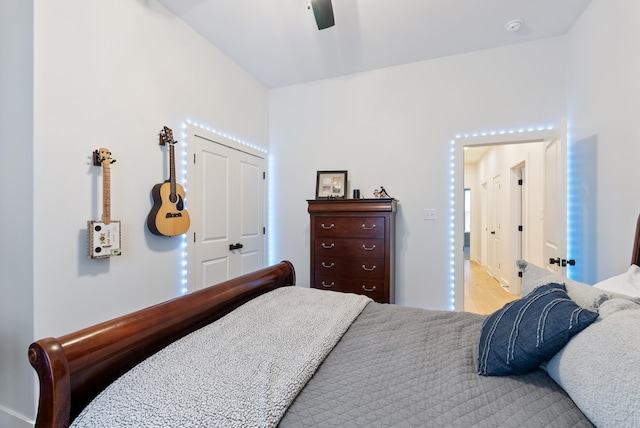 bedroom with hardwood / wood-style flooring and ceiling fan