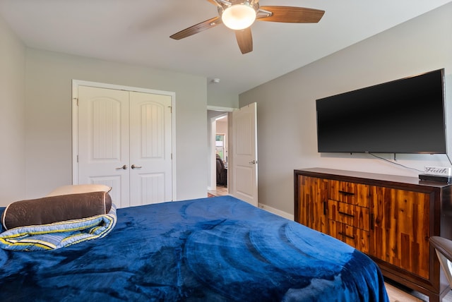 bedroom featuring a closet and ceiling fan