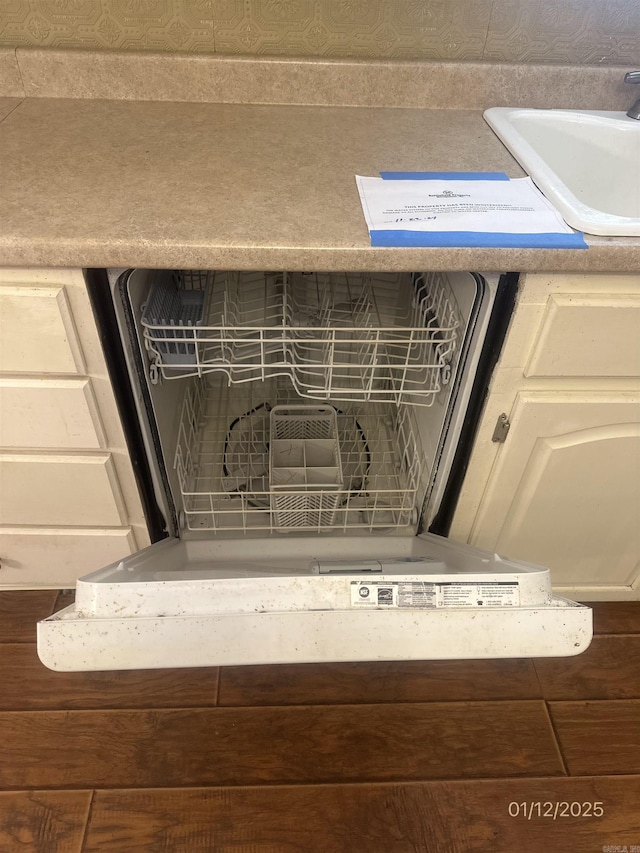 1013 Elm St, Coal Hill, AR 72832 - details with sink and cream cabinets