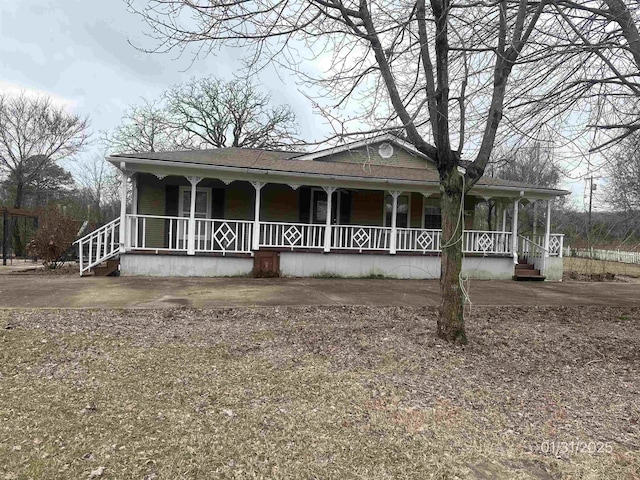1013 Elm St, Coal Hill, AR 72832 - view of front of home with covered porch