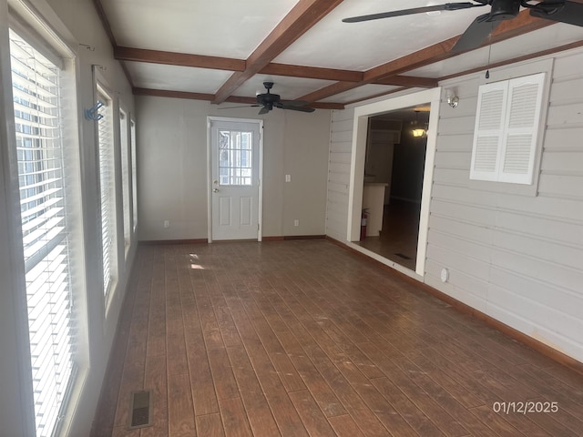 1013 Elm St, Coal Hill, AR 72832 - interior space featuring dark hardwood / wood-style flooring, ceiling fan, coffered ceiling, and beamed ceiling